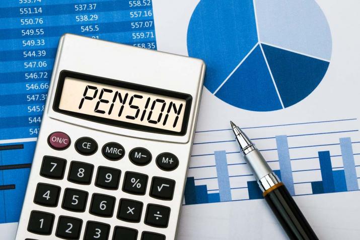 Pensions: the display of a calculator showing the word 'pension'. Next to it are coloured diagrams and tables