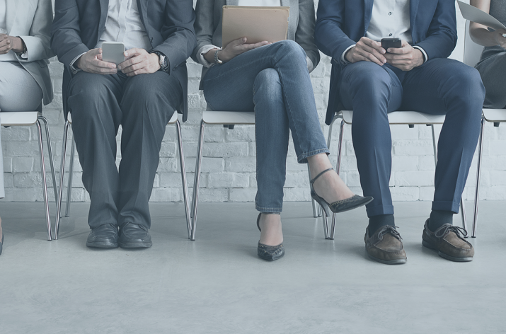 Jobs: a photo of a number of job applicants waiting